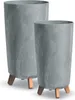 Two gray planters with a concrete effect are shown on a white background. The planters have three wooden legs. Produktbild-Vorschau