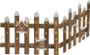 A wooden fence decorated with small birdhouses and illuminated by LED lights. Náhled obrázku produktu