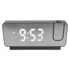 A digital alarm clock with a mirrored display and projection feature. Anteprima dell’immagine prodotto