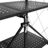 A close-up view of a black metal shelf unit, focusing on the connection mechanism between two shelves. Voir les images du produit
