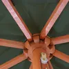 Close-up view of the internal structure of a green umbrella, showing wooden ribs and the central mechanism. Náhled obrázku produktu