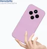 A hand holding a purple phone case with a camera module visible. Produktbild-Vorschau