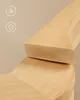 Close-up of wooden hangers with icons indicating eco-friendliness and quality. Náhled obrázku produktu