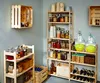 A pantry or storage area with wooden shelves filled with jars, bottles, and containers. Produktbild-Vorschau