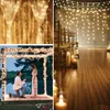 A collage of images showing string lights used for decoration in various settings, including a proposal scene, a wedding aisle, and draped curtains. Anteprima dell’immagine prodotto