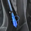 Close-up of a blue hydration tube and mouthpiece attached to a black backpack. Náhled obrázku produktu