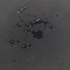 Water droplets on a black textured surface. Voir les images du produit