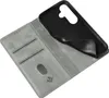 A gray flip cover phone case is shown open, revealing its interior card slots and a black phone holder. Produktbild-Vorschau