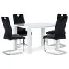 A white dining table with four black chairs, presented on a white background. Produktbild-Vorschau