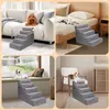 A collage of four images showing a gray pet staircase in different home settings with dogs. Produktbild-Vorschau