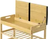 A close-up, partially opened bamboo storage bench with a lift-top lid. Produktbild-Vorschau
