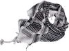 A black and white patterned scarf is laid out on a white background. Náhled obrázku produktu