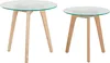 Two round tables with glass tops and wooden legs are shown against a white background. Náhled obrázku produktu