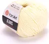 A ball of light yellow yarn with a label. Náhled obrázku produktu