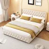 A bedroom scene with a bed as the main focus. Voir les images du produit