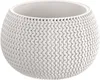 A white knitted-look plant pot on a white background. Anteprima dell’immagine prodotto