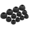 A collection of black silicone earbud tips arranged on a white background. Anteprima dell’immagine prodotto