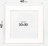 A white picture frame with dimensions indicated. Produktbild-Vorschau