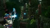 A young woman is aiming a glowing blue bow and arrow in a lush, green forest setting. The scene appears to be from a video game. Produktbild-Vorschau