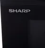 A close-up shot of a black microwave oven with the brand name 'SHARP' visible. Voir les images du produit