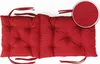 A red bench cushion with tufted sections and ties, shown against a white background. A circular inset shows a close-up of the fabric texture. Produktbild-Vorschau