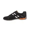 A side view of a black and white sneaker with orange accents. Anteprima dell’immagine prodotto