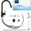A black kitchen faucet and its components are laid out on a white background, along with its packaging. Produktbild-Vorschau