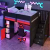 A loft bed with integrated desk, storage, and stairs, set in a modern room with LED lighting. Produktbild-Vorschau