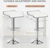 Two white bar stools are shown side-by-side, with text overlays highlighting their features. Produktbild-Vorschau