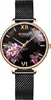 A close-up studio shot of a women's wristwatch with a floral pattern on the dial. Náhled obrázku produktu