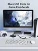 A computer setup with a monitor displaying a video game, a keyboard, mouse, game controller, and a game console. Náhľad obrázku produktu