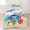 A Disney Stitch themed duvet cover and pillowcase set on a bed. Produktbild-Vorschau
