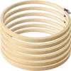 A stack of wooden embroidery hoops. Produktbild-Vorschau