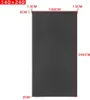 A dark grey roller blind with measurement indicators. Voir les images du produit