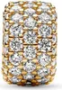A close-up view of a gold charm encrusted with clear stones. Podgląd zdjęcia produktu