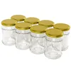 A group of empty glass jars with gold lids are arranged on a white background. Podgląd zdjęcia produktu