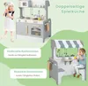 A collage showing a child playing with a wooden toy kitchen from different angles, highlighting its dual-sided functionality. Náhled obrázku produktu