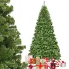 A green artificial Christmas tree with presents underneath, set against a white background. Produktbild-Vorschau