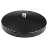 A black, round base with a threaded metal connector in the center, isolated on a white background. Náhľad obrázku produktu