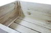 Close-up view of the interior of a wooden raised garden bed. Produktbild-Vorschau