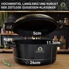 A black cast iron pot and lid are shown with dimensions indicated by text overlays. The background is a kitchen setting. Produktbild-Vorschau