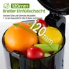Close-up of a juicer's wide opening filled with fruits and vegetables, with text overlays highlighting its features. Podgląd zdjęcia produktu