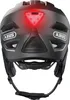 Rear view of a black bicycle helmet with a red LED light illuminated. Voir les images du produit