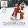 Two children on a sled in the snow. Produktbild-Vorschau