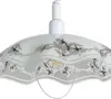 A close-up view of a pendant lamp with a floral design. Náhled obrázku produktu