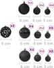 A collection of black Christmas ornaments of various sizes and textures, with size and quantity labels. Náhľad obrázku produktu