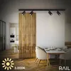 A modern dining and kitchen area with track lighting. Anteprima dell’immagine prodotto
