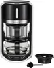 A white and black coffee maker with a glass carafe and a separate black bowl and scoop. Náhled obrázku produktu