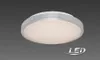 A ceiling light fixture with a white diffuser and a silver-colored rim, set against a gray background. Produktbild-Vorschau