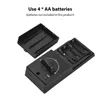 The image shows the back of a black smart lock with the battery compartment open, revealing the battery slots. The lid of the battery compartment is also shown open. Text above the lock indicates that it uses 4 AA batteries. Podgląd zdjęcia produktu